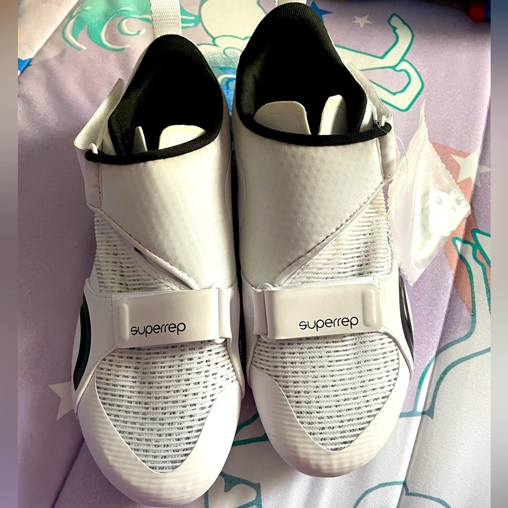 White and black cycling shoes